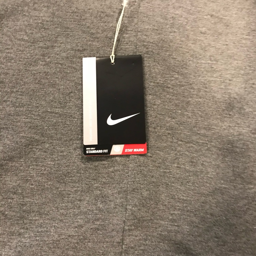 Nike golf. Dri-fit. Standard fit shirt.